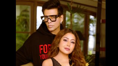 Karan Johar (top) and Neha Kakkar